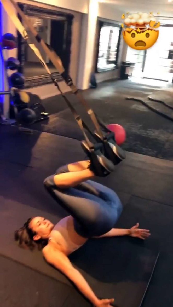 Nina Dobrev in Tights and Sports Bra - Workout