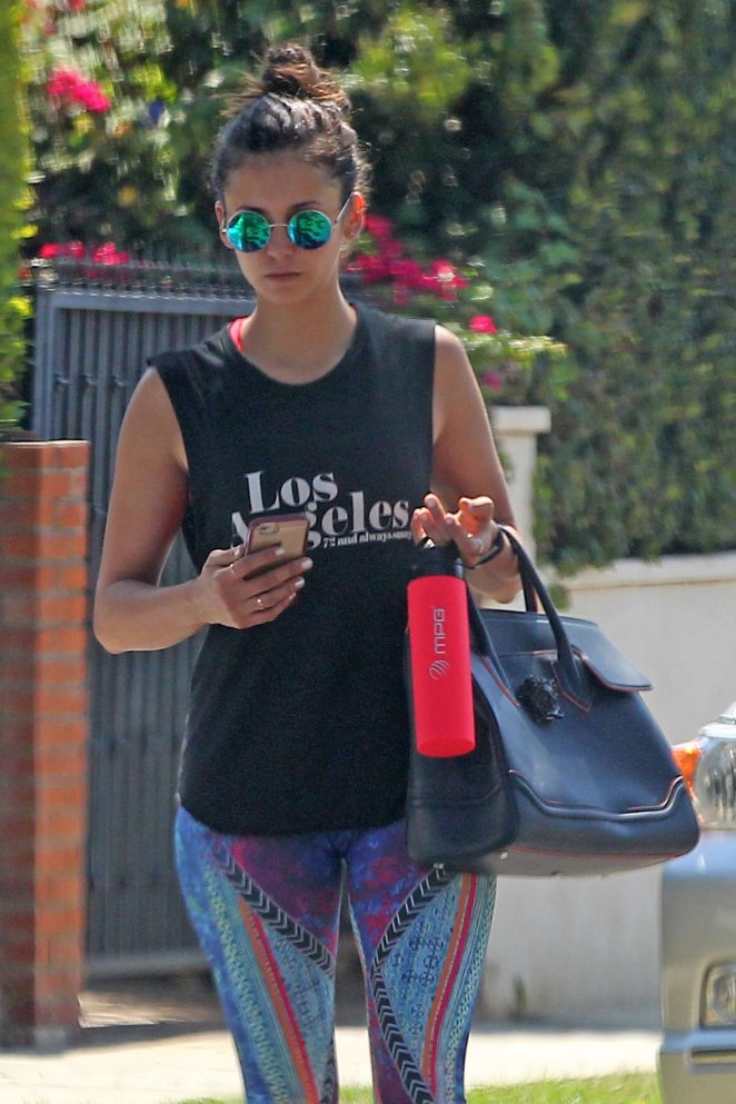 Nina Dobrev in Tights headed to the gym in Los Angeles