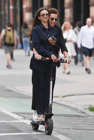Nina Dobrev - Rides a scooter through New York