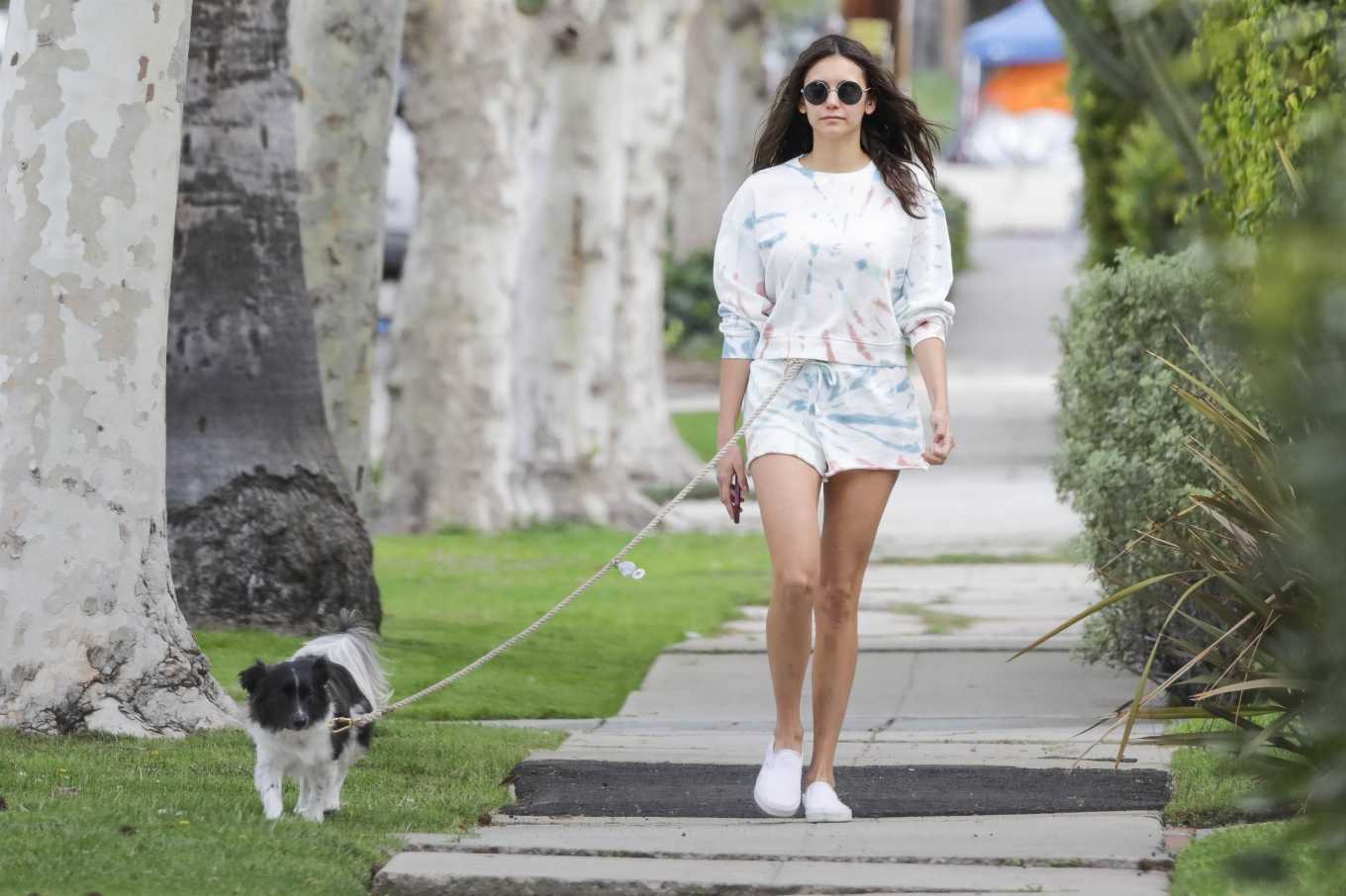 Nina Dobrev â€“ Takes her dog for a walk in Los Angeles
