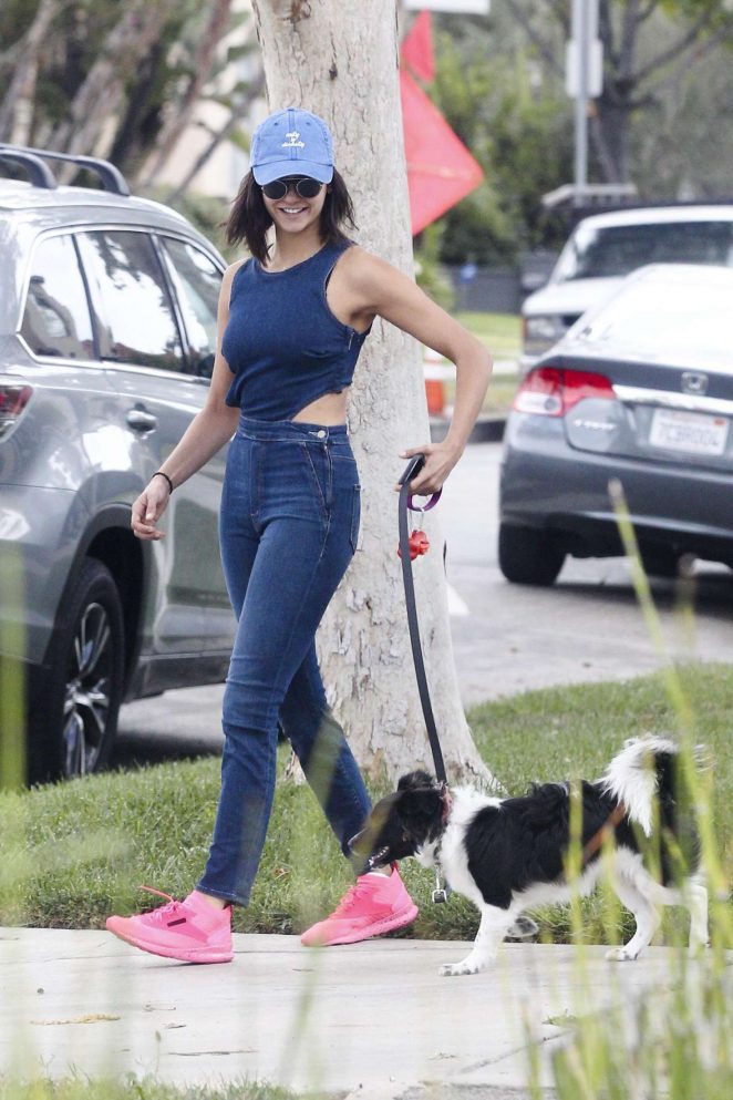 Nina Dobrev Takes her dog Maverick out for a walk in LA