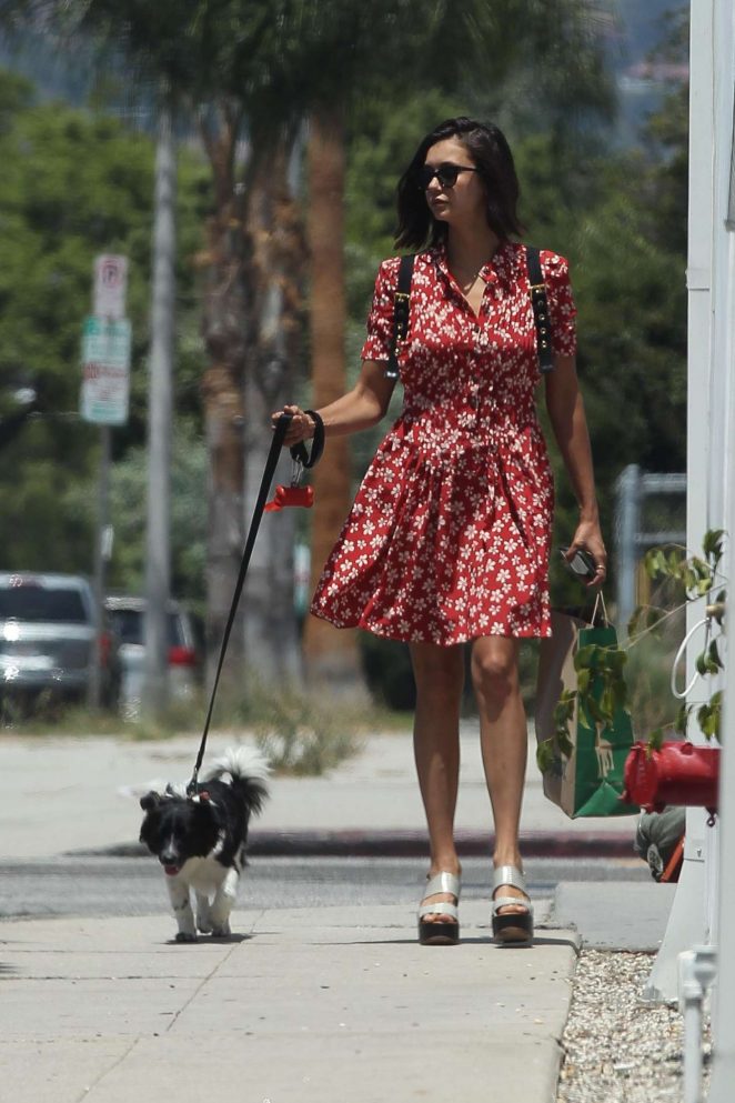 Nina Dobrev - Takes her dog Maverick out for a walk in LA
