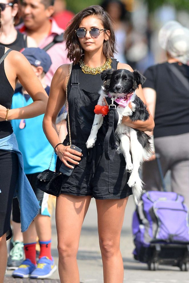 Nina Dobrev - Takes her dog Maverick out for a walk in NYC