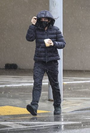 Noor Alfallah - Braves the rain for a coffee in Los Angeles