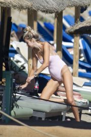 Olivia Attwood in Swimsuit on a beach in Marbella