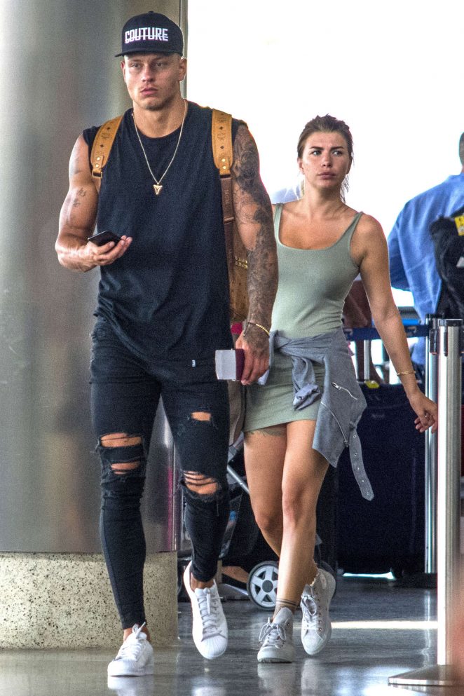 Olivia Buckland in Short Dress at Airport in Barbados