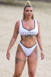 Olivia Buckland in White Bikini on the beach in Barbados