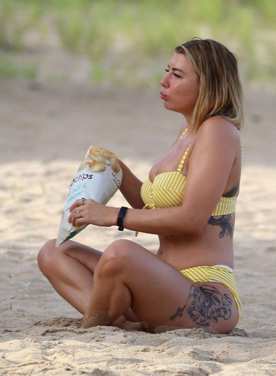 Olivia Buckland in Yellow Bikini at the beach in Barbados