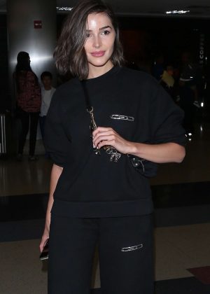 Olivia Culpo in Black - Arrives at LAX airport in Los Angeles