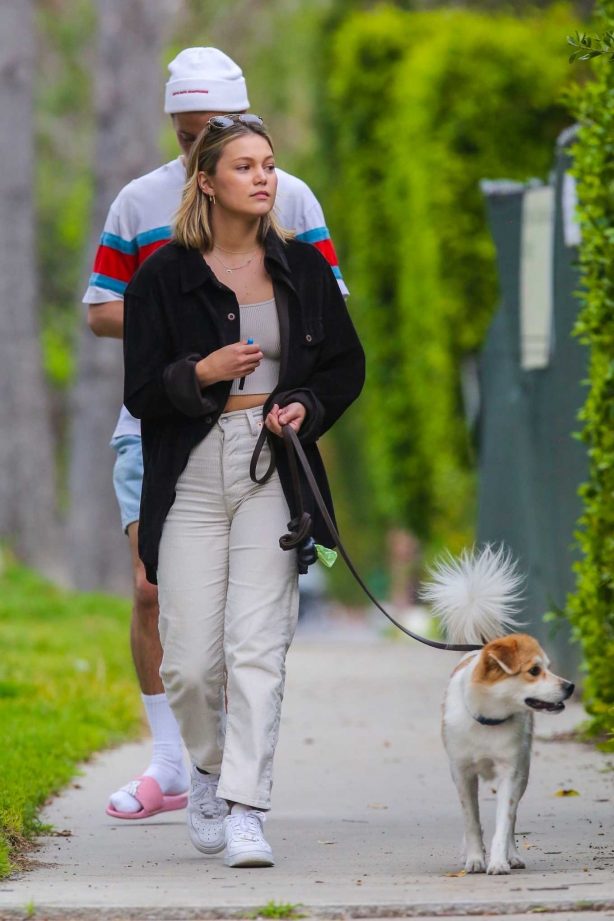 Olivia Holt - Walks her dog with a mystery friend in Los Angeles
