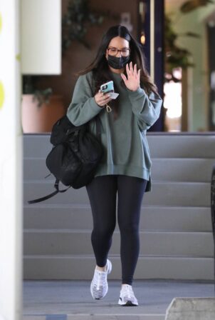 Olivia Munn - In a green sweatshirt and black leggings in Santa Monica