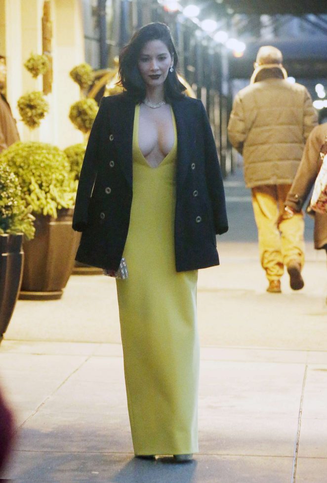 Olivia Munn in Long Yellow Dress Leaves her hotel in New York