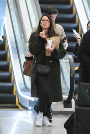 Olivia Munn - With John Mulaney arrived into Laguardia airport in New York