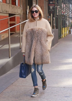 Olivia Palermo in fur coat and ripped Jeans in New York City