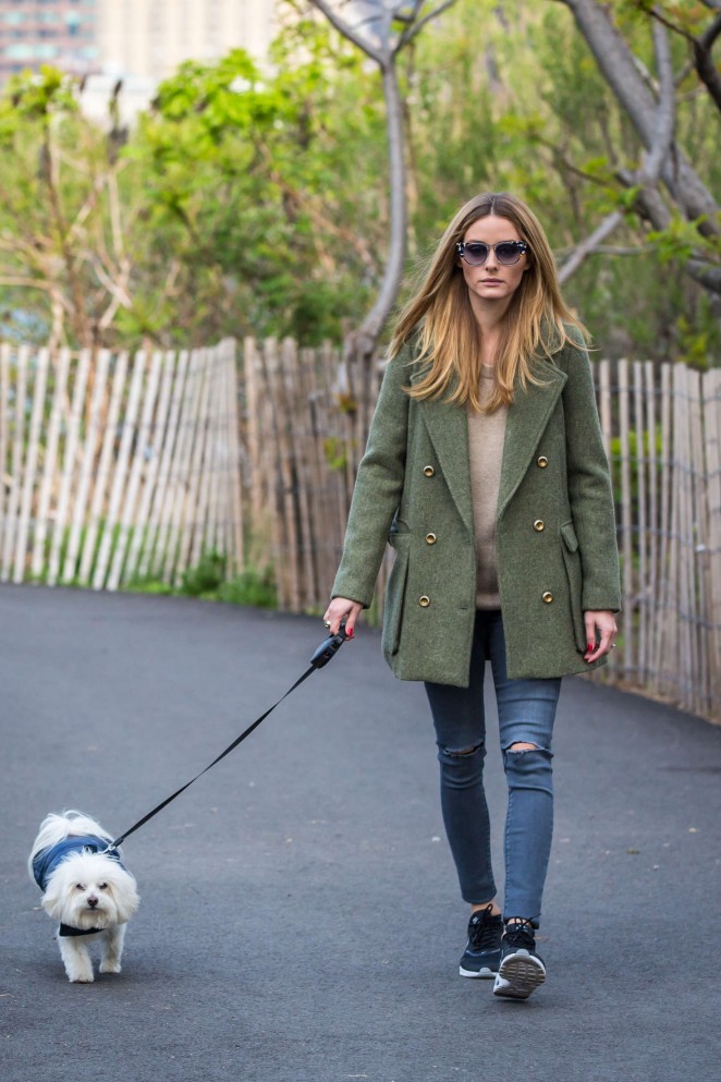 Olivia Palermo in jeans walking her dog in Brooklyn