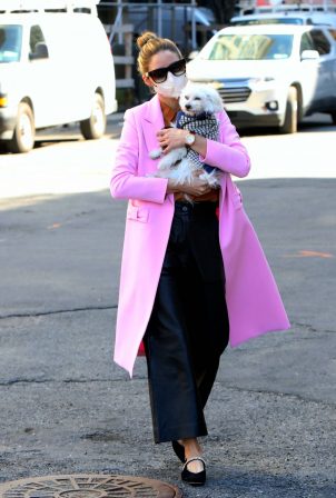 Olivia Palermo - In pink coat as she takes her dog Mr Butler out for a walk in Brooklyn