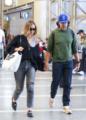 Olivia Wilde and Jason Sudeikis - Arriving at LAX Airport in Los Angeles