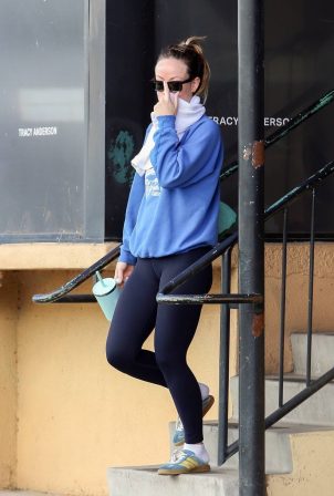 Olivia Wilde - Hides her smile as she departs from gym in Los Angeles