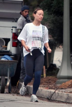 Olivia Wilde - In leggings out for a solo walk in Los Angeles