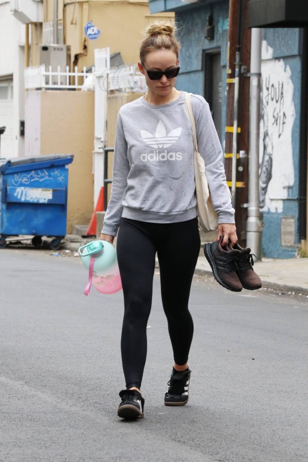Olivia Wilde - Is seen carrying her workout trainers in Los Angeles