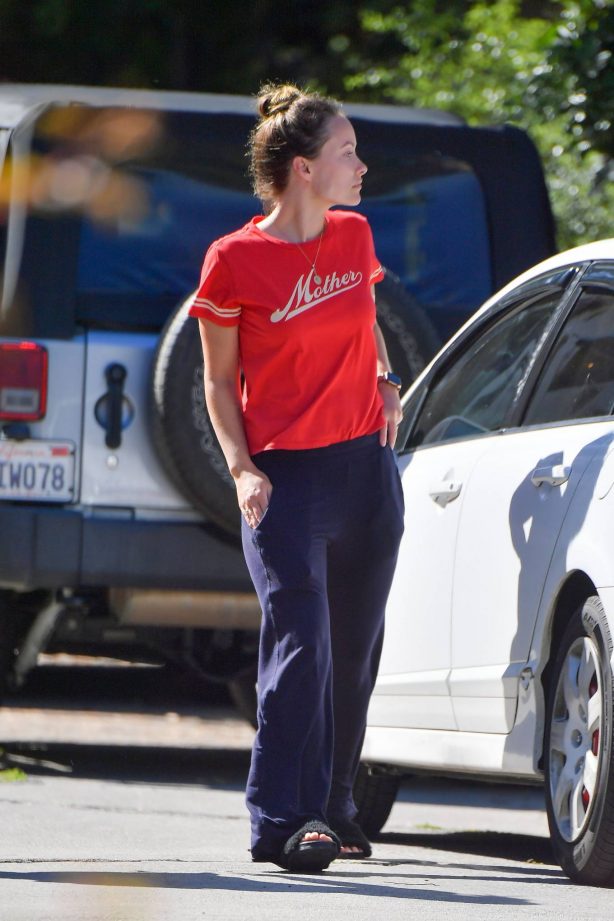 Olivia Wilde - Wearing fuzzy slippers and a red shirt in LA