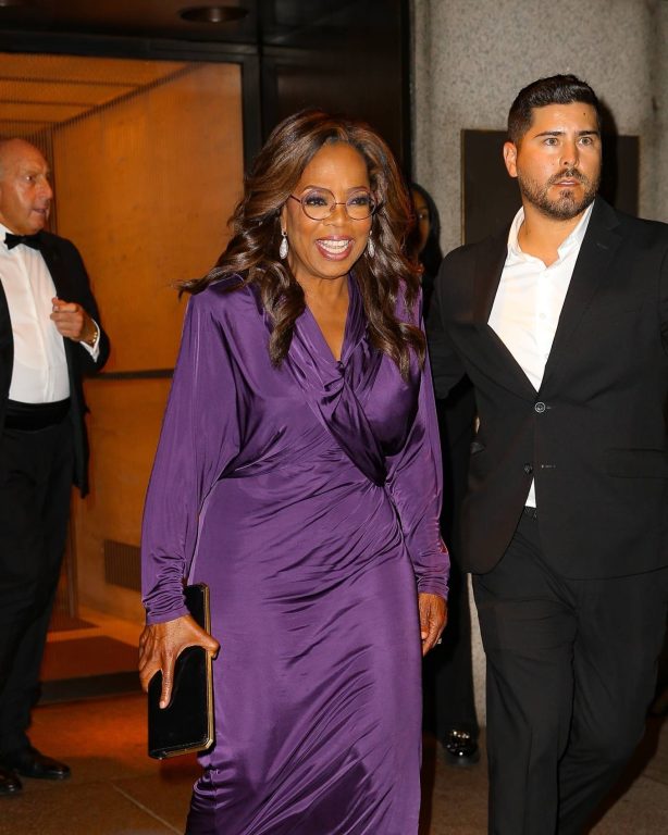 Oprah Winfrey - Is spotted in a purple dress after a Caring For Women Dinner in New York