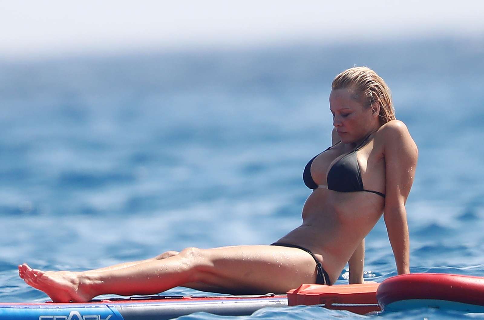 Pamela Anderson in Black Bikini in The French Riviera in France. 