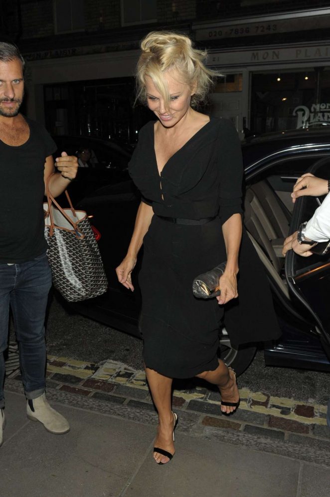 Pamela Anderson in Black Dress Leaves Ivy Restaurant in London