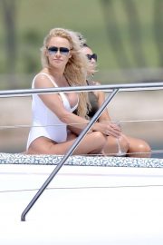 Pamela Anderson in White Swimsuit for a photoshoot on the Gold Coast