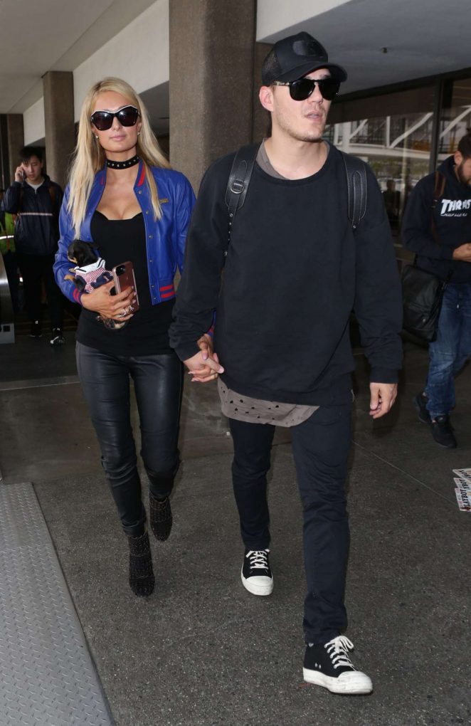 Paris Hilton and Boyfriend at LAX Airport in Los Angeles
