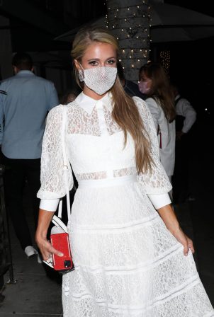 Paris Hilton in White Dress at Madeo Restaurant in Beverly Hills