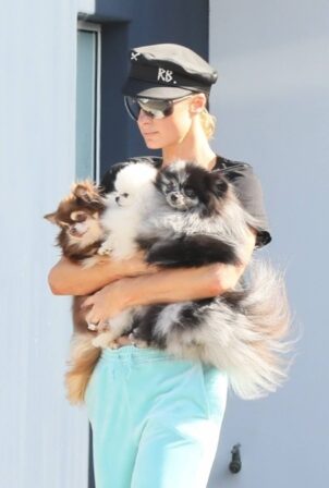 Paris Hilton - Seen with her 3 Pomeranians and her husband Carter Reum in Malibu