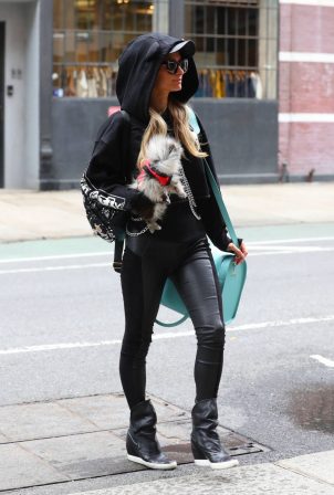 Paris Hilton - Wearing PU leather black pants in New York