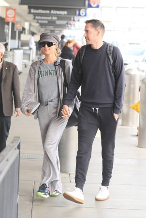 Paris Hilton - With Carter Reum catch a flight out of Los Angeles