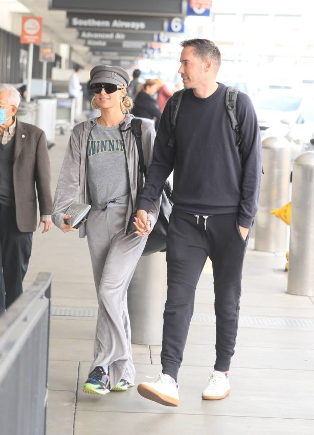 Paris Hilton - With Carter Reum catch a flight out of Los Angeles