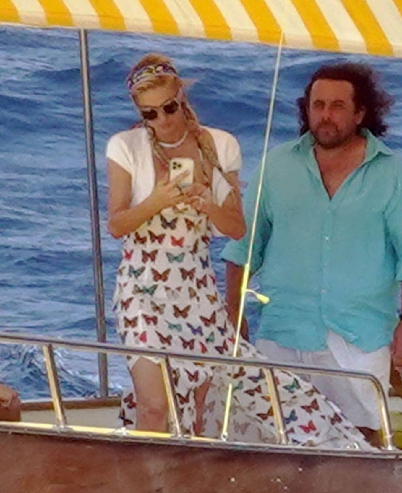 Paris Hilton - With her husband Carter Reum on a boat ride in Capri