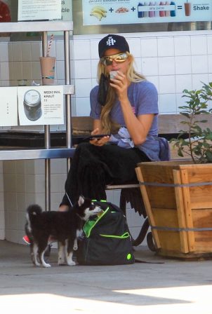 Paris Hilton - With her puppy out in Hollywood