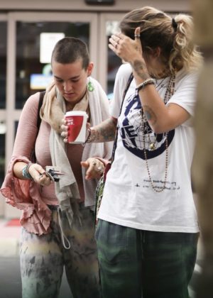 Paris Jackson at a gas station with a friend in Calabasas