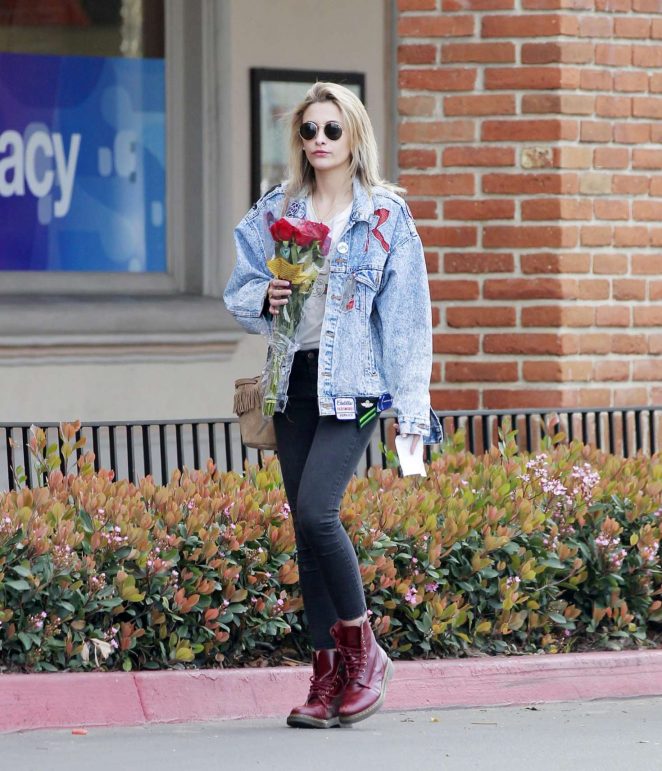 Paris Jackson buys a bouquet of red roses in Malibu