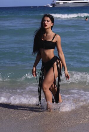 Paula Suarez - Pictured in a flowing black bikini in Miami