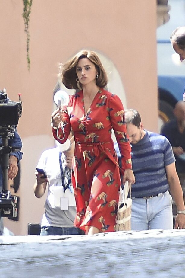 Penelope Cruz - In a red dressshooting Emanuele Crialese's 'L'immensita' in Latina