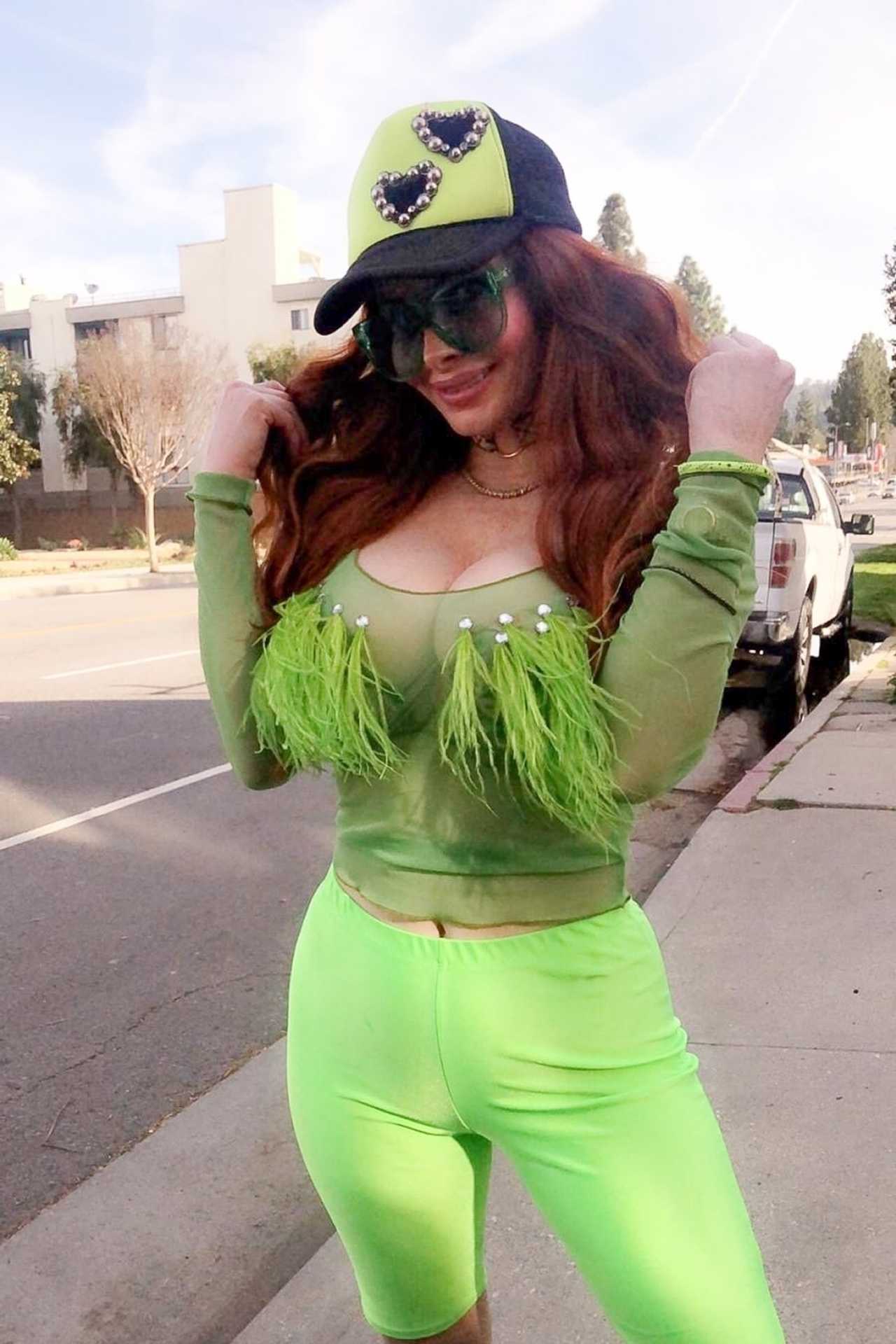 Phoebe Price â€“ In a neon green look while out walking her dog in Beverly Hills