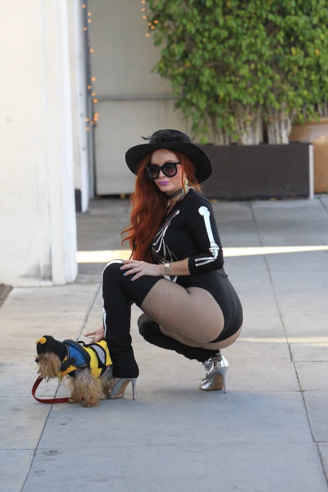 Phoebe Price in Halloween costume with her dog in Beverly Hills
