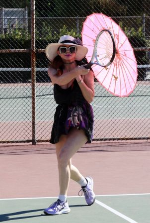 Phoebe Price - Posing with an umbrella and hitting tennis balls at the courts in Los Angeles