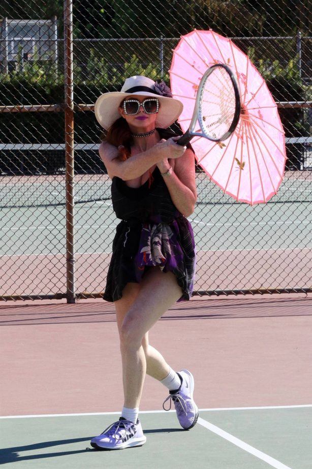 Phoebe Price - Posing with an umbrella and hitting tennis balls at the courts in Los Angeles