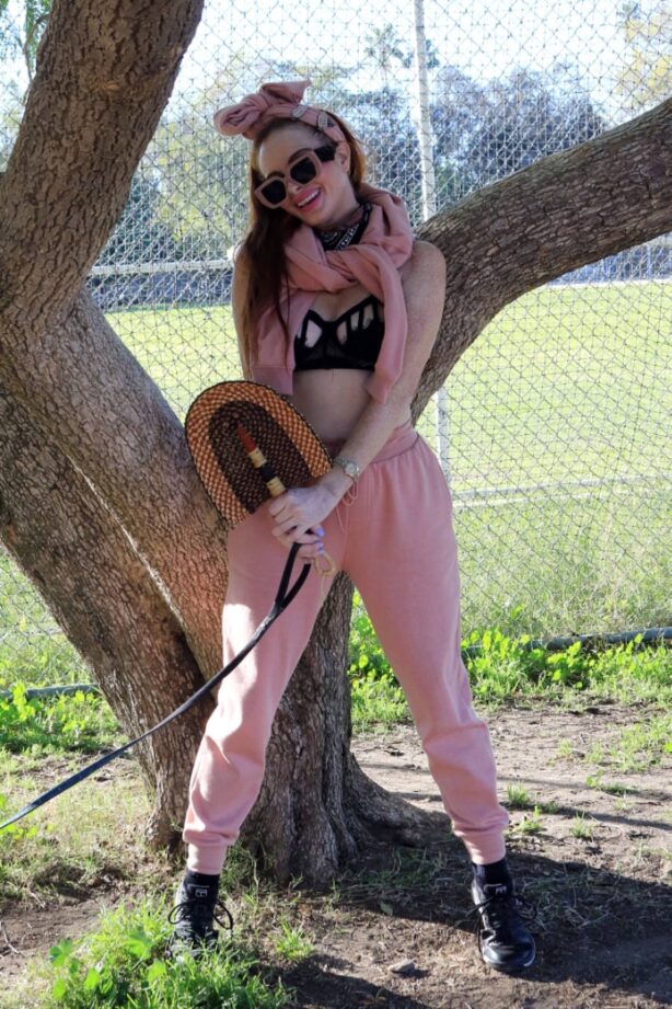 Phoebe Price - Posing with her dog at the park in Los Angeles