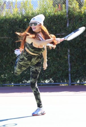Phoebe Price - Practicing tennis wearing a camouflage outfit in Los Angeles