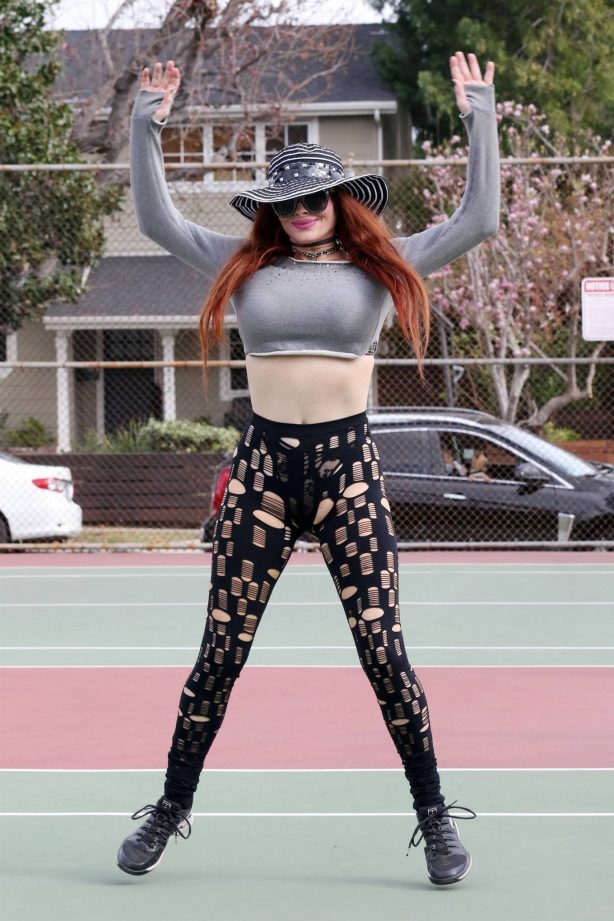 Phoebe Price - Seen stretchingat the tennis courts in Los Angeles