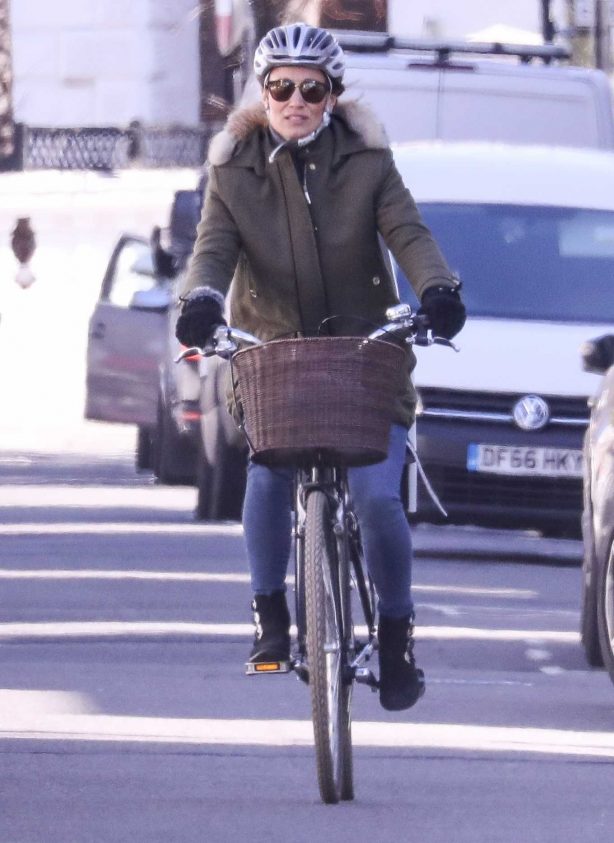 Pippa Matthews on her bicycle in West London