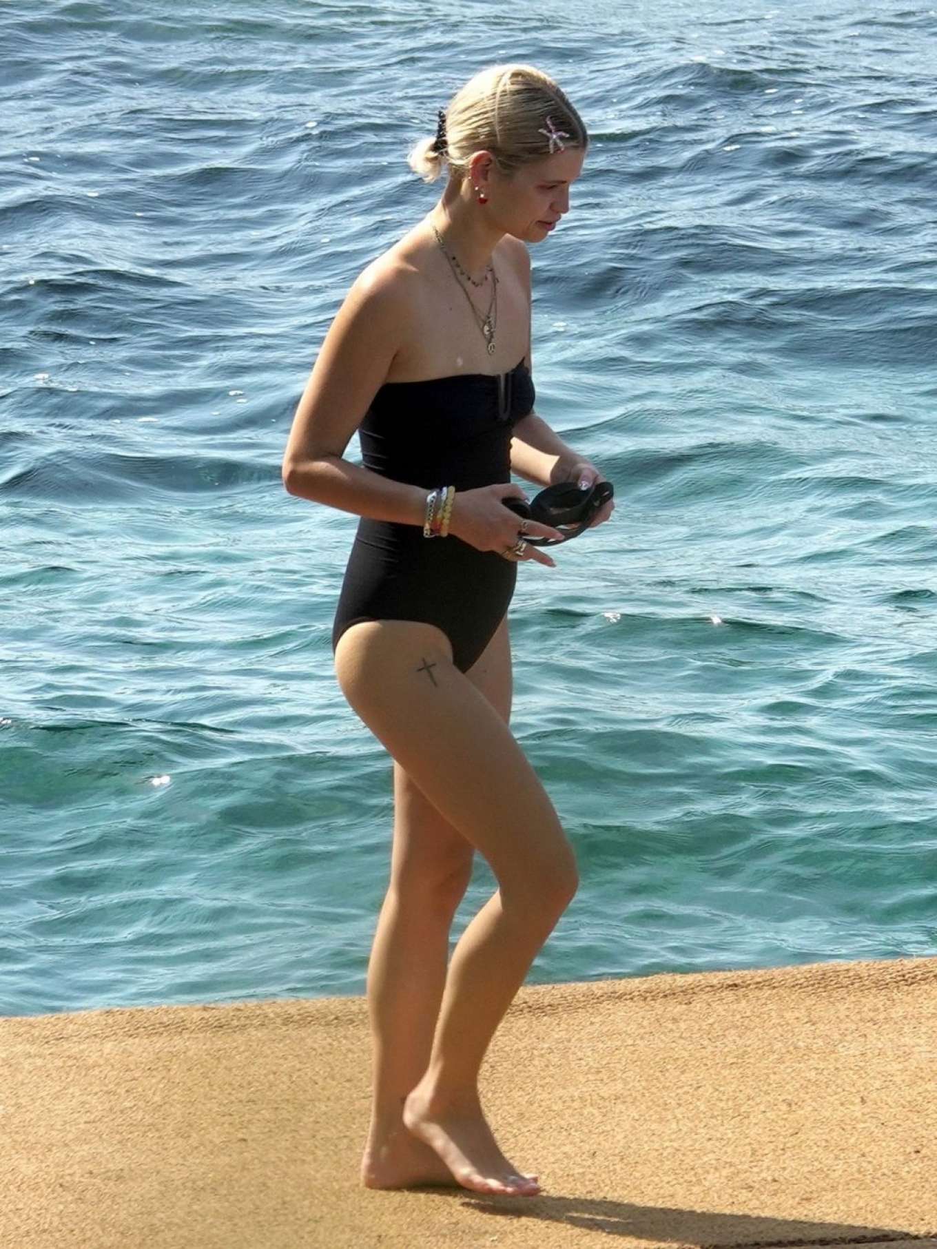 Pixie Geldof in Black Swimsuit on the beach in Capri